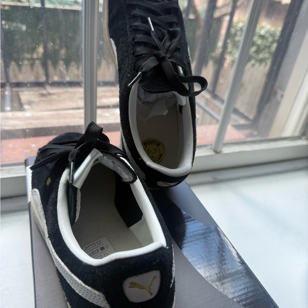 Puma Suede Classic (Charles F. Stead edition) in black/white.